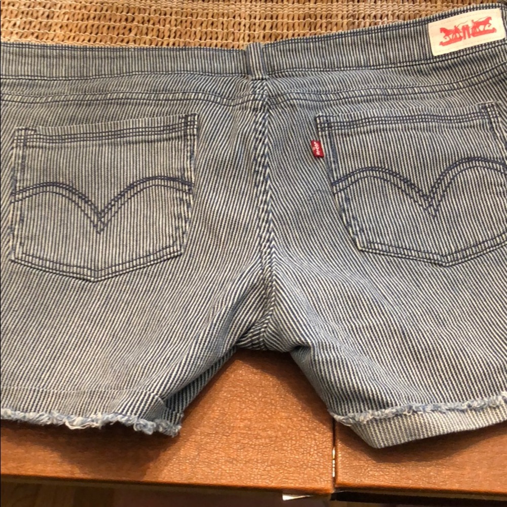 Levi’s shorts. Pinstriped